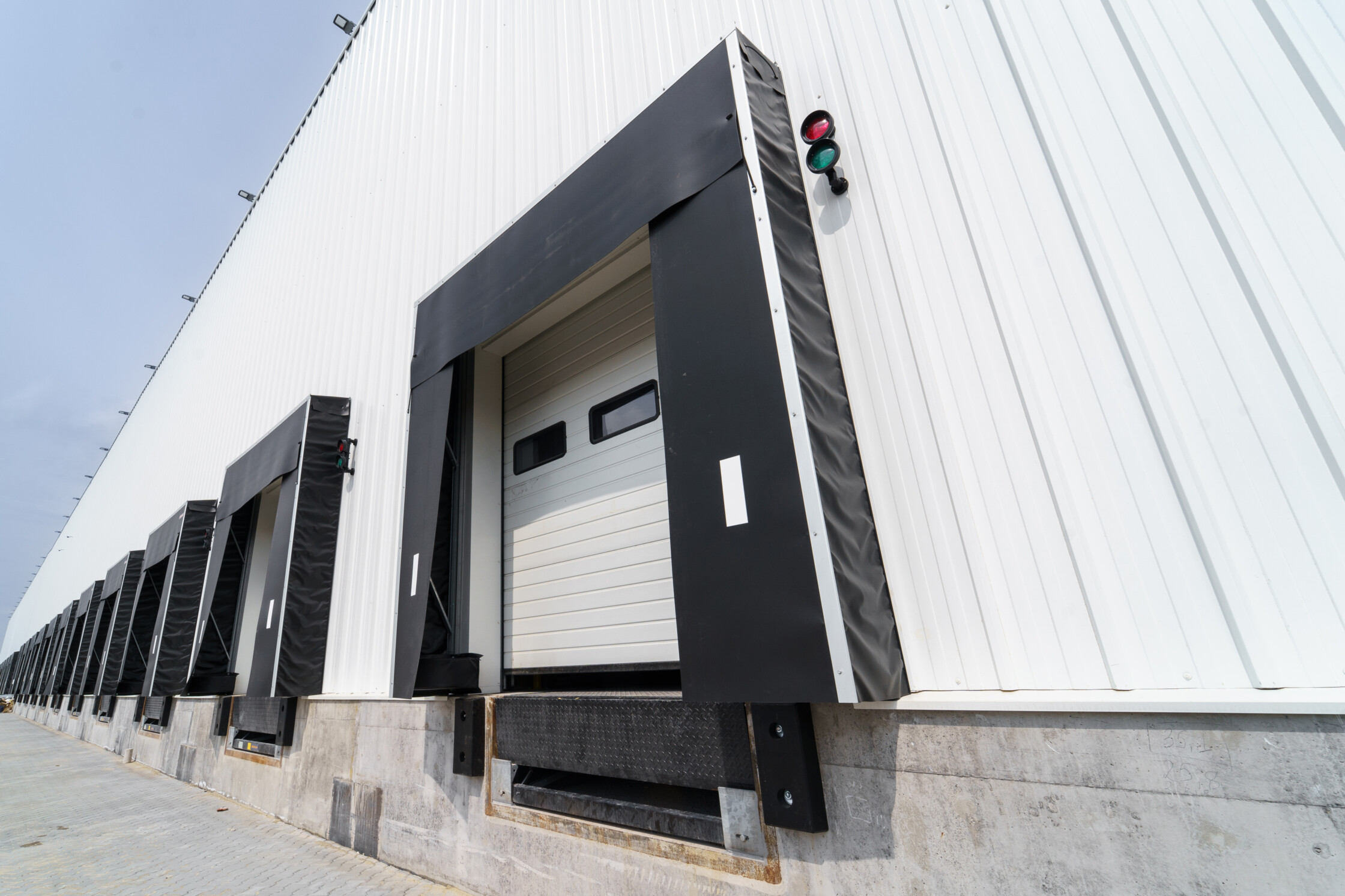 Modern loading dock bays with sealed doors and sig 2024 12 07 12 16 39 utc